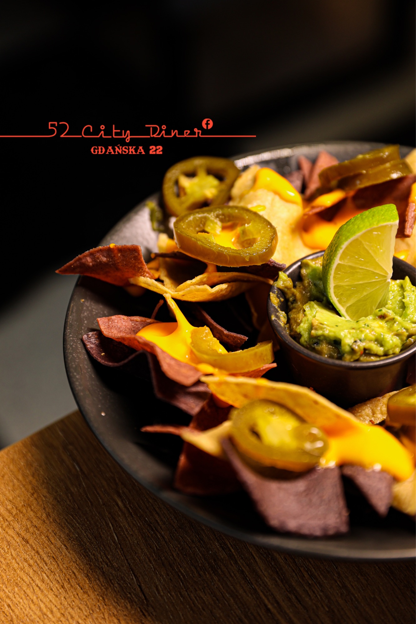 Nachos - cheddar dip, guacamole, jalapeno