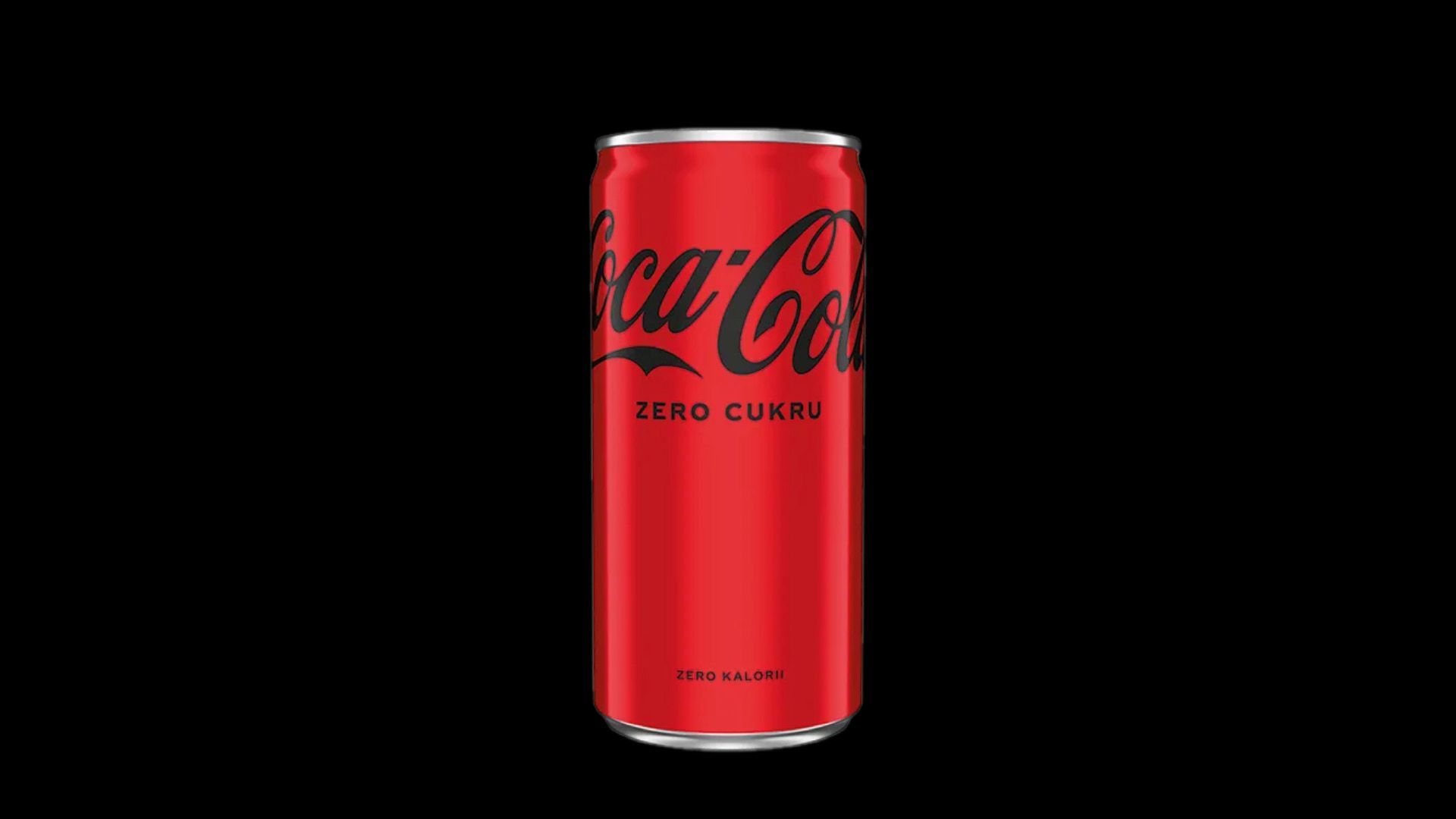 Puszka Coca-Cola Zero Cukru na czarnym tle, z napisem "zero kalorii".
