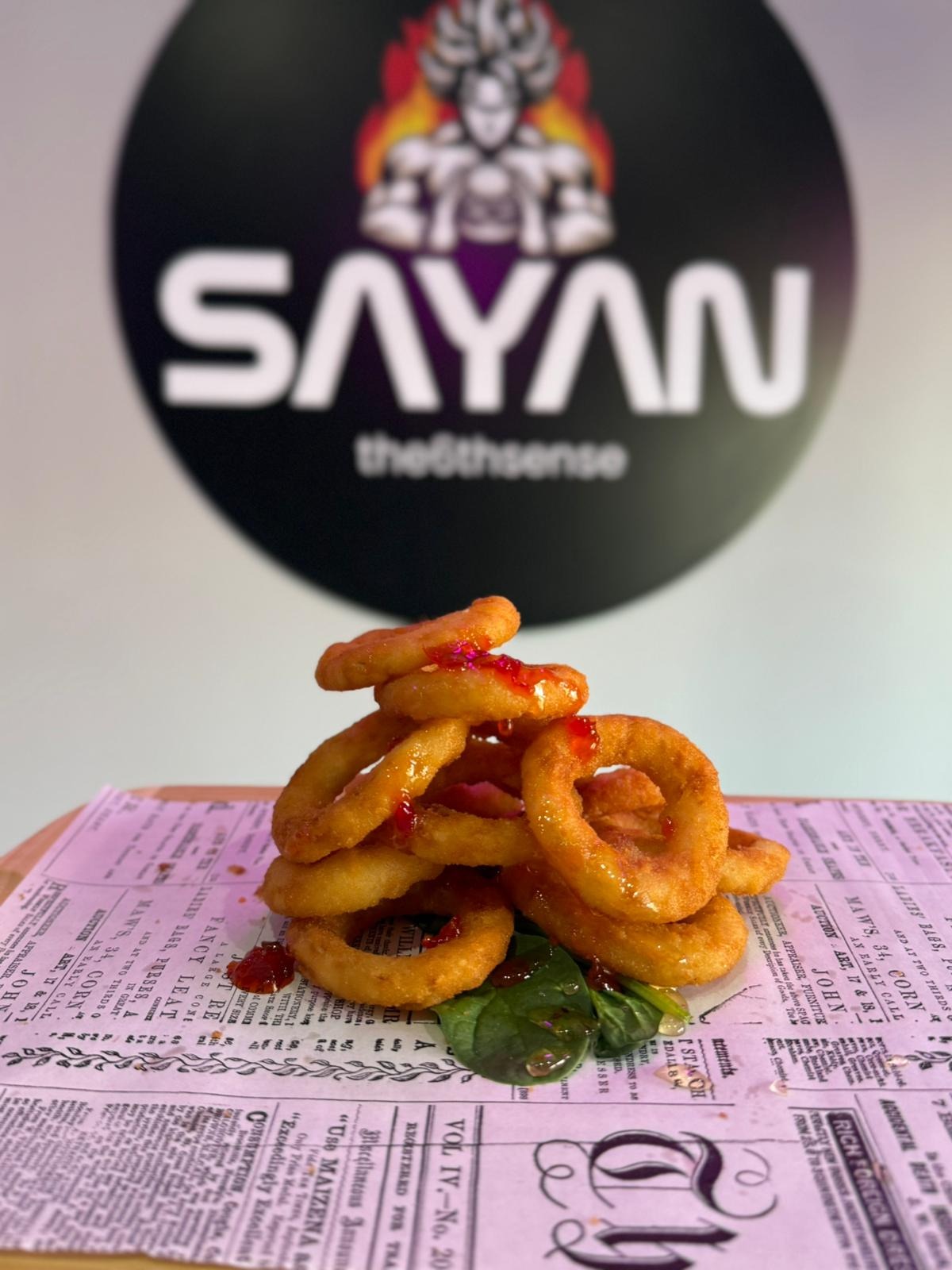 10 Inele de ceapa , sos inclus