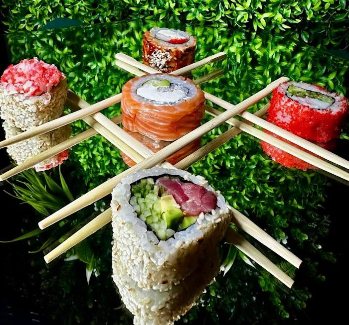 Sushi rolls with chopsticks