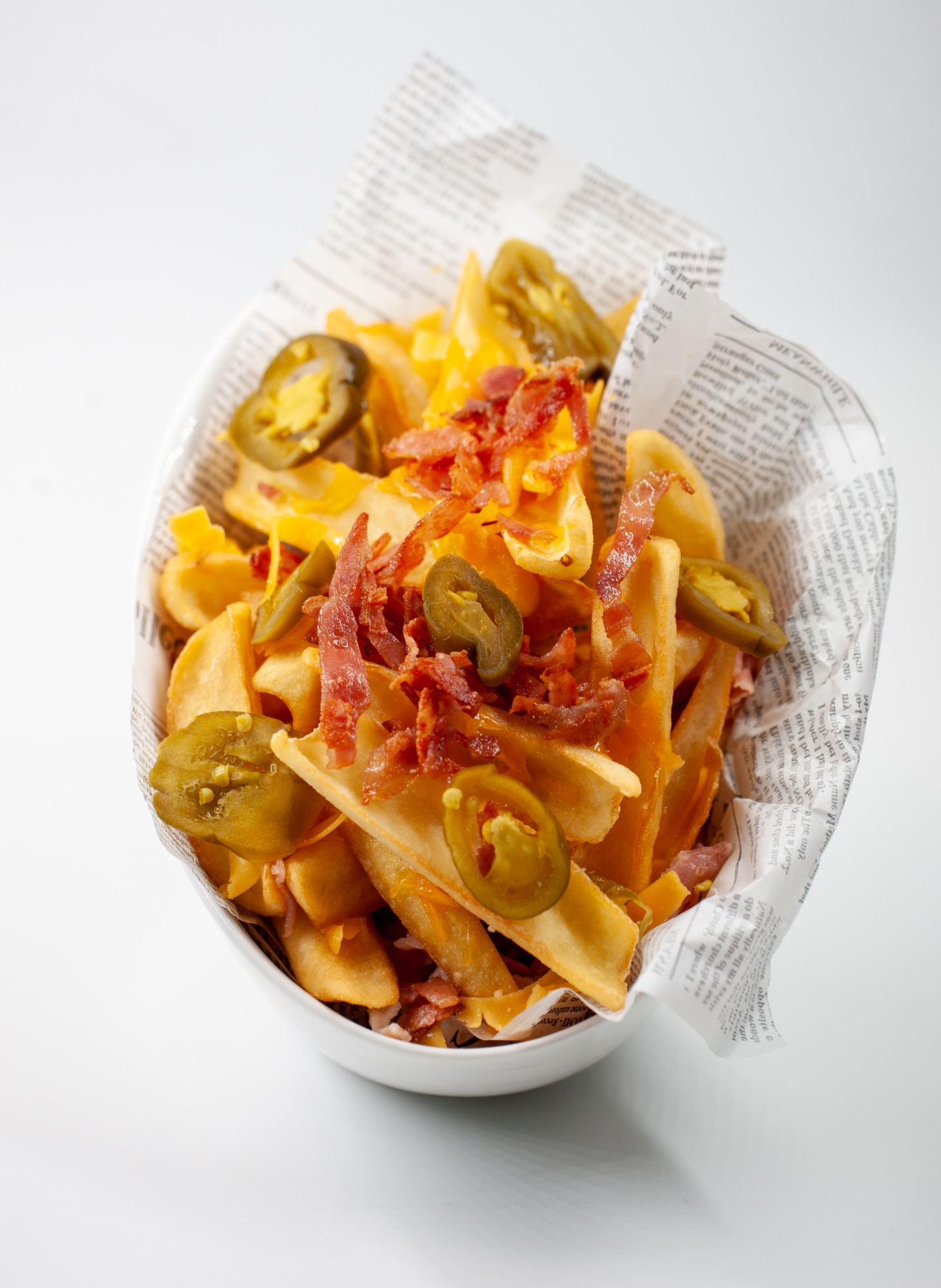 Cartofi fry’n Dip cu ceddar topit, bucăți de crispy bacon şi jalapeno 