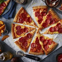 10 Kuponów - dowolna pizza Gratis*