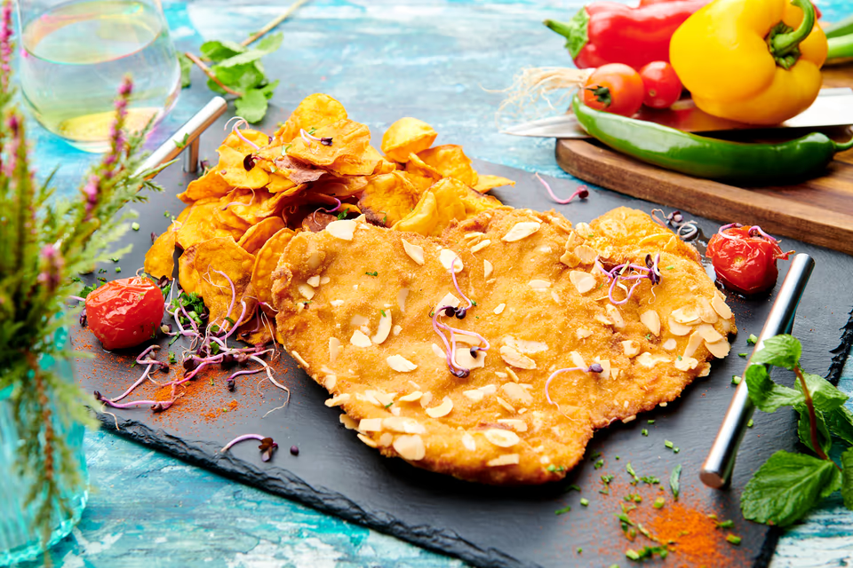   Snitel urias de porc in crusta de seminte  Snitel urias de porc in crusta de seminte