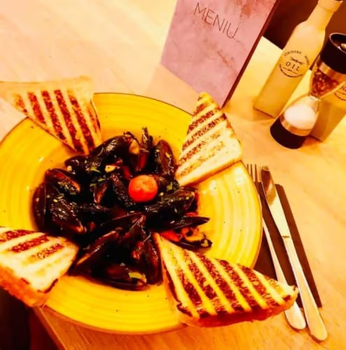 Scoici in sos de vin