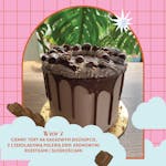 Wzór 2: Ciemny tort na kakaowym biszkopcie, z czekoladową polewą drip, kremowymi rozetkami i cukrową posypką