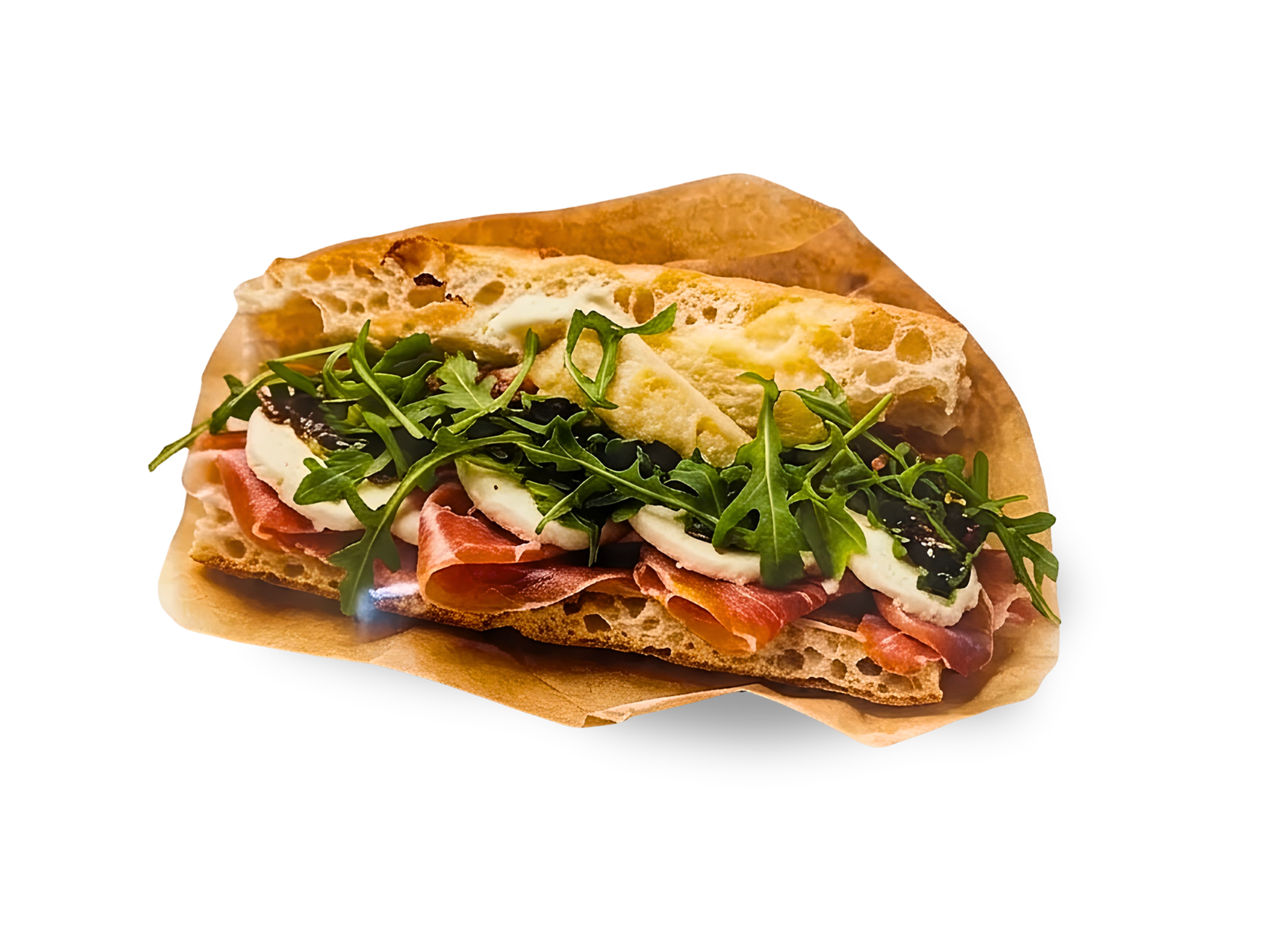 Kanapka z rukolą, szynką, serem mozzarella i czarnymi oliwkami na chrupiącym pieczywie.