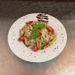 PENNE PASTA WITH CREAM AND BOLETUS SAUCE WITH GRILLED CHICKEN BREAST 