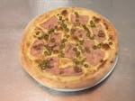 CAKE BASED ON PIZZA DOUGH WITH GARLIC OIL BAKED WITH HAM AND GREEN OLIVES 